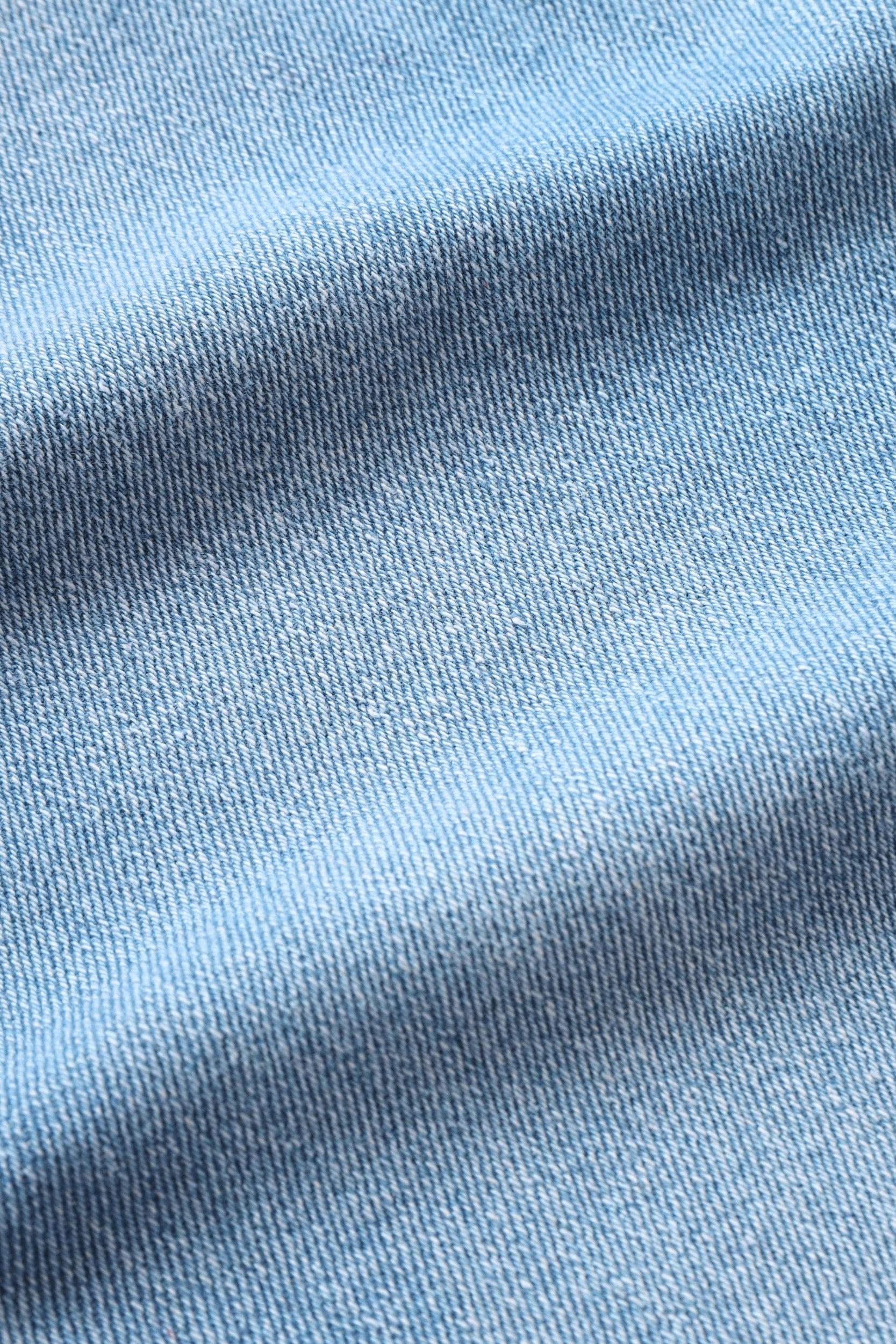 Stylish denim cloth with seams · Free Stock Photo